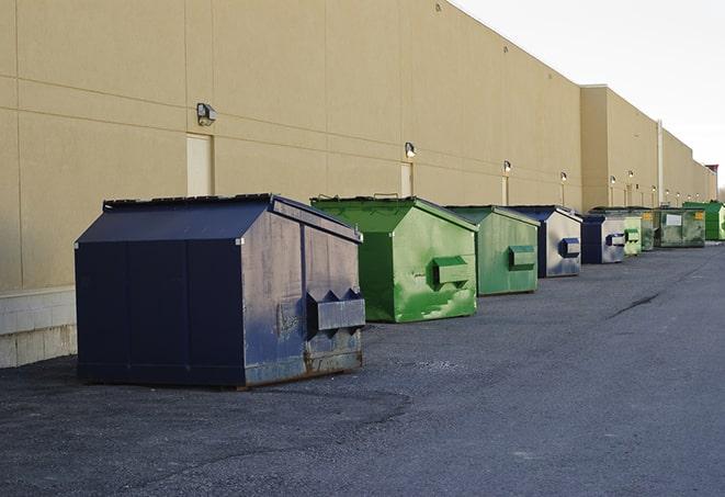 construction waste bins waiting to be picked up by a waste management company in Burns Flat, OK